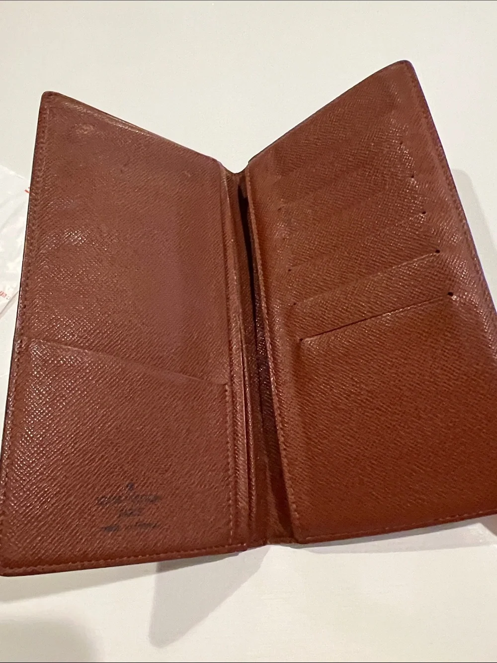 Authentic vintage Louis Vuitton long vertical bi-fold wallet and checkbook holde